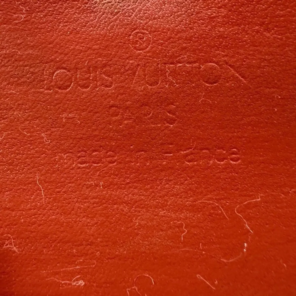 AUTHENTIC Louis Vuitton Malletier Epi Leather Elise Wallet. Deep brown.